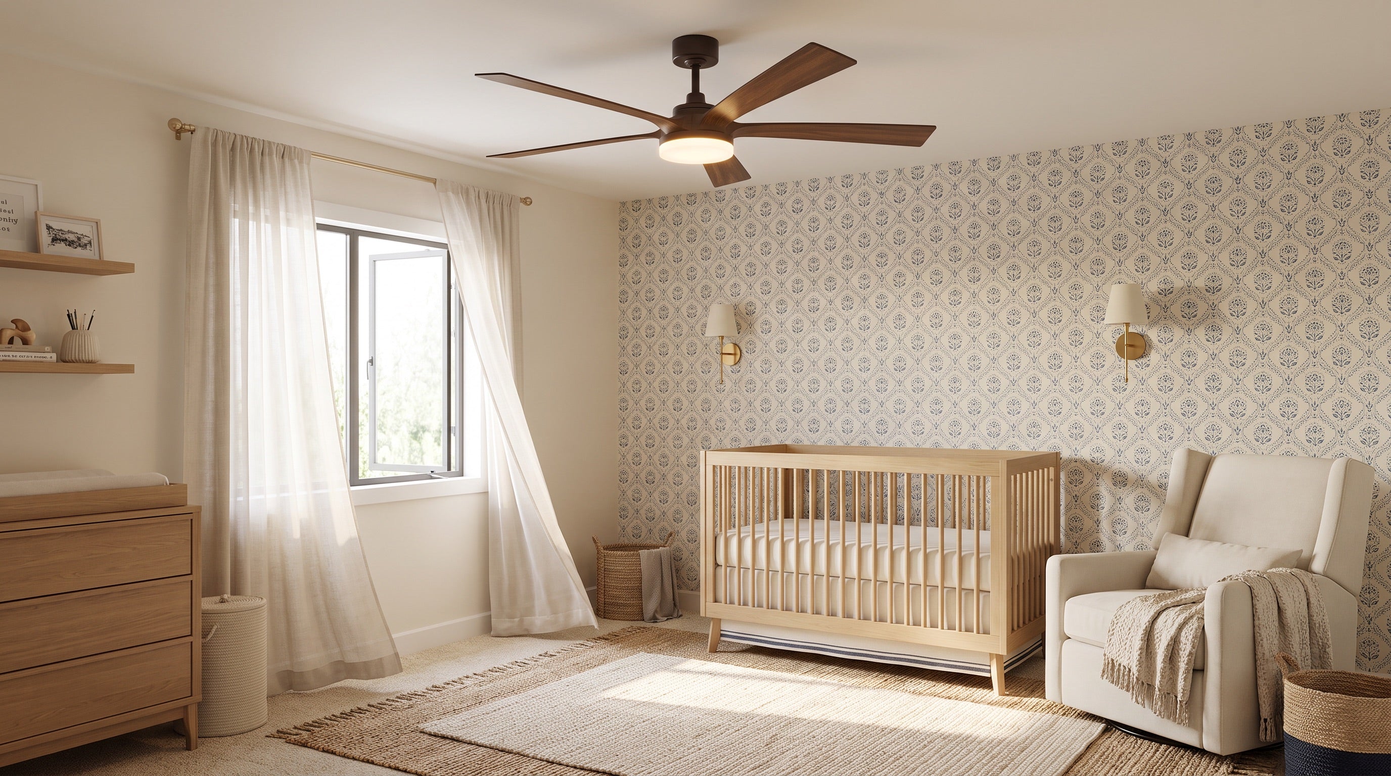 A bright, airy nursery with a bare crib beneath a ceiling fan, morning light through the window.